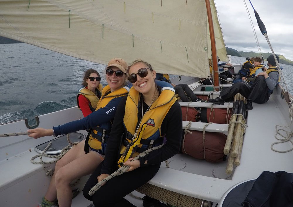 McKenzie (front right) sailing home after the wind picked up.